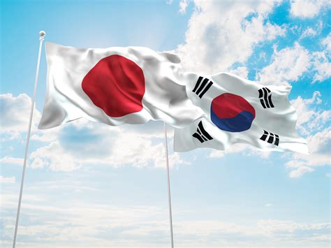 3d Illustration Of Japan And South Korea Flags Are Waving In The Sky
