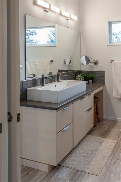 Stylish versatility 1900 series offers our widest array of door styles, materials, finish options, and features. Modern Bathroom - Warsaw Custom Cabinets