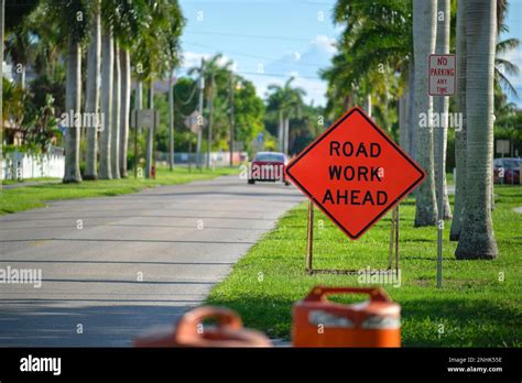 Road Work Ahead Sign On Street Site As Warning To Cars About