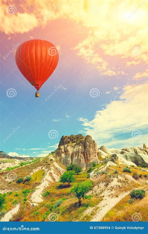 Hot Air Balloon Over Cappadocia Stock Photo Image Of Cones