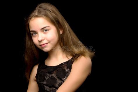 Close Upportrait Of A Cute Little Girl On A Black Background Stock