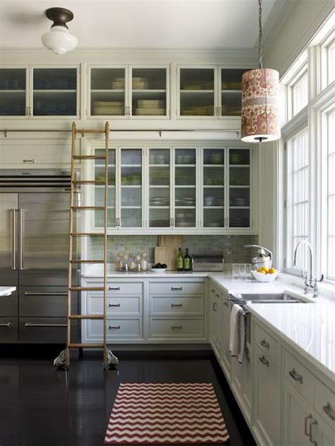 It may not be practical or attractive to run. When Should Cabinetry Go to the Ceiling?