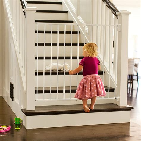 This gate has everything that baby gates for stairs should have. Munchkin Extending XL Tall and Wide Baby Gate, Hardware ...
