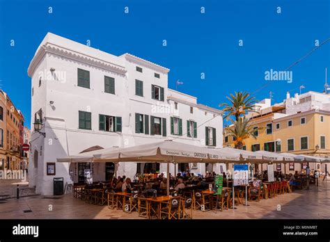 People Sitting Outside A Cafe Bar In Ciutadella De Menorca Menorca