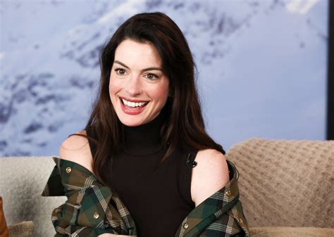 Anne Hathaway Just Wore A Corset Puffer Coat Over A Sexy Winter Lbd—see