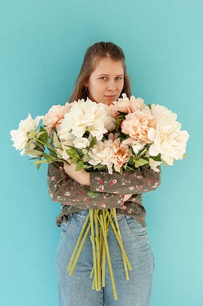 Free Photo Lovely Woman Holding Flower Bouquet