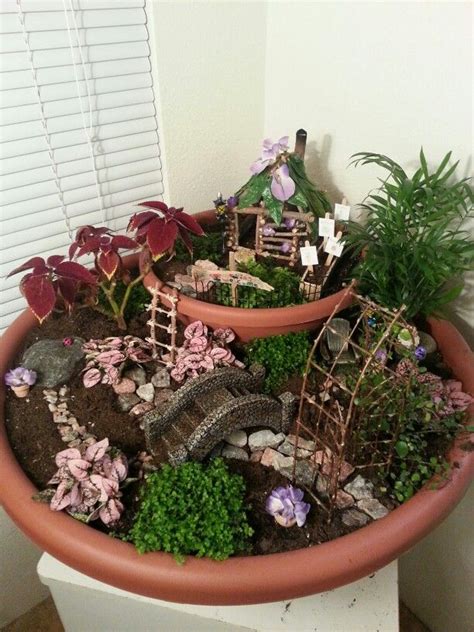 These easy diy fairy gardens are so easy to make and the perfect way to spend a magical afternoon at home with your kids! 17 of The Coolest DIY Fairy Garden Ideas For Small Backyards