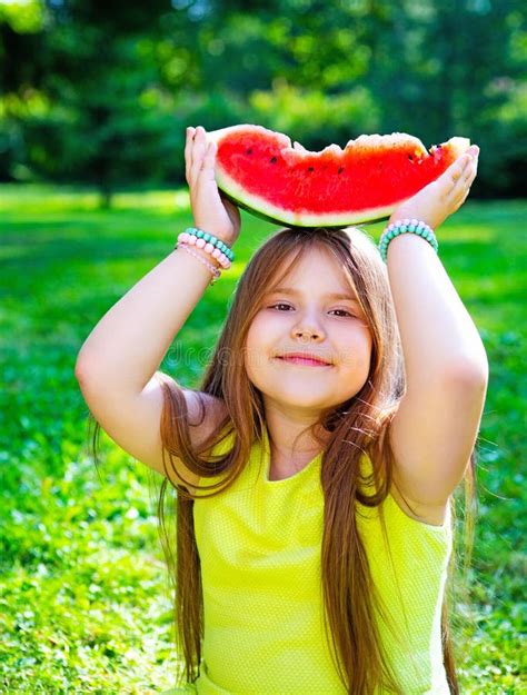 Girl Eating Watermelon Outdoor Stock Image Image Of Field Adorable