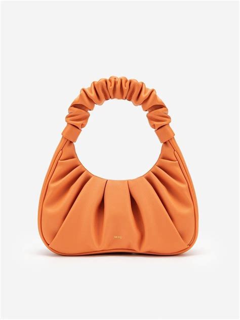 5 Trendy Handbag Colors That Are Winning Spring 2020 | Who What Wear | Trendy handbags, Orange ...