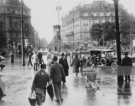 The heyday of potsdamer platz was in the 1920s and 1930s. Queen Elizabeth II and Prince Philip pose with members of ...