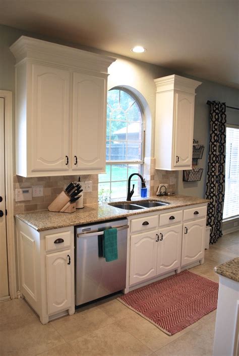 13 common mistakes people make when painting kitchen cabinets, including rushing, not sanding, and more. Kitchen makeover: we painted our dark wood cabinets white ...