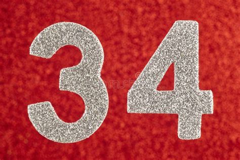 Number Thirty Four Silver Color Over A Red Background Anniversary