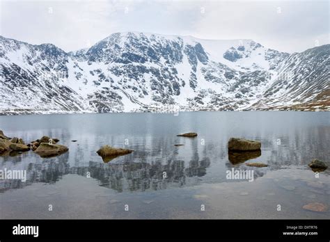 Helvellyn From Red Tarn In Winter Lake District Cumbria Uk Stock Photo