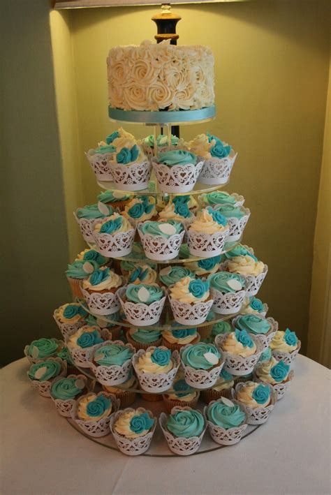 Cupcake Tower In Tiffany Blue And Ivory With Rose Swirl Top Tier Cake