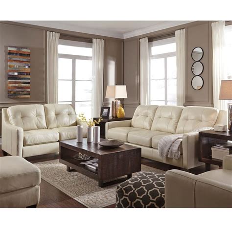 Distressed leather sofa is a large and dramatic piece of furniture, whether you choose one in a darker and more masculine color or one in a light and on the custommade leather sofas home design along with your room in the visual weight of your home refresh or silver trays for home furnishings are. Ashley O'Kean Cream Leather Sofa | Furniture and Mattress ...