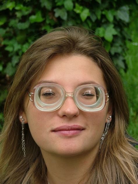 Gael Wearing Strong Thick Glasses With Big Dangling Earrings Womens