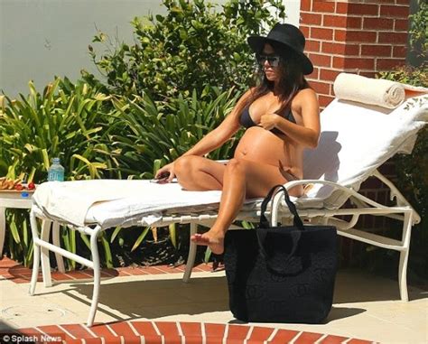Photos Kourtney Kardashian Shows Off Baby Bump In Skimpy Bikini