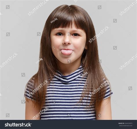 Cute Little Girl Tongue Out Foto De Stock 524223973 Shutterstock