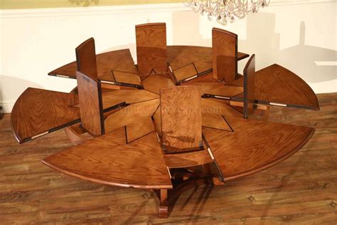 The avalon black 45 extension dining table is designed by blake tovin of tovin design and is a crate and barrel exclusive. Solid Walnut Round Arts and Crafts Expandable Dining Room ...