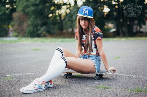 Girl Sitting Skateboard Baseball Caps White Stockings Jean Shorts Wallpaper