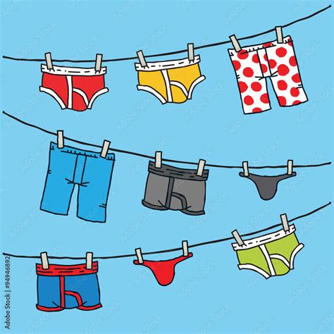 A Set Of A Variety Of Colorful Cartoon Underwear Hang To Dry On An