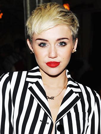 Miley cyrus just ushered in the new year in classic miley fashion: Why Miley Cyrus Really Loves Her Short Hair | InStyle.com