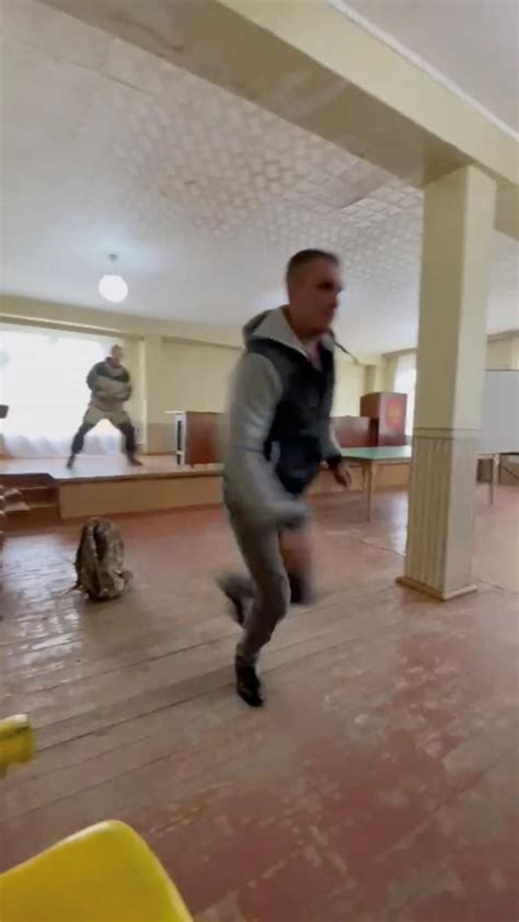 Gunman Attacks Russian Military Recruiter As Thousands Flee