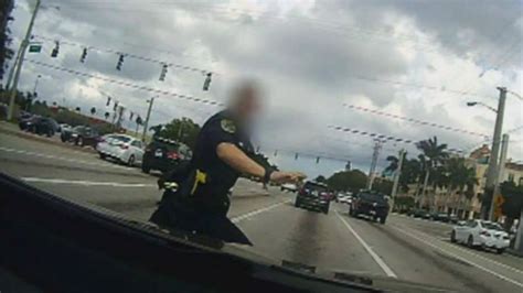 Florida Police Officer Struck By Suv In Dashcam Video While Chasing