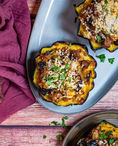 Stuffed Acorn Squash With Sausage And Apple Farro Stuffing Cherry On