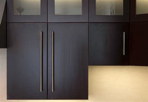 While other doors and wood products in your home are able to get by without having to adjust to big fluctuations in humidity and temperature, they aren't exposed to the same level of cleaning and moisture as the wood in your kitchen and bathrooms. flat front cabinets