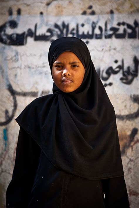 Portrait Of A Little Girl Wearing The Chador In The Old City Of Ibb