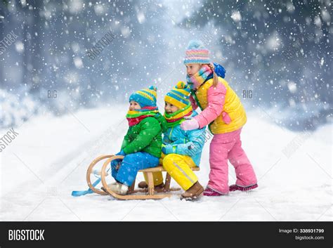 Children Playing Snow Image And Photo Free Trial Bigstock