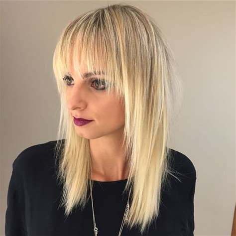 We do believe that long tresses and a fringe is a badass combo. Long Blonde Shaggy Layered Cut with Fringe Bangs - The ...