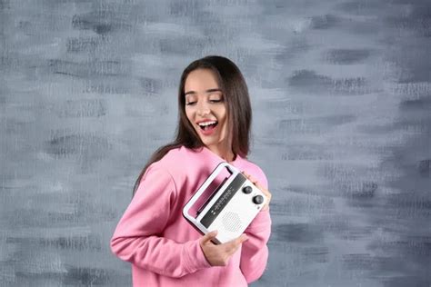 Young Woman Listening To Radio Stock Image Everypixel