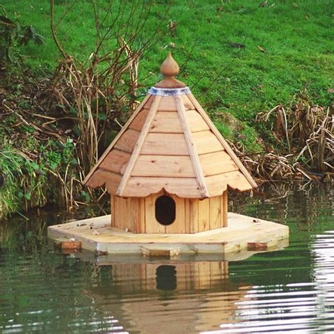 Custom floating duck houses keep your ducks safe in our floating duck house. Boughton Chicken Coop | Duck house, Duck house plans ...