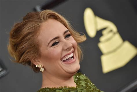 adele accused of cultural appropriation for her bantu knots hairstyle and jamaican flag bikini