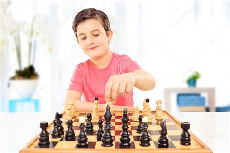 Boy Playing Chess Stock Photo By ©ljsphotography 45891201