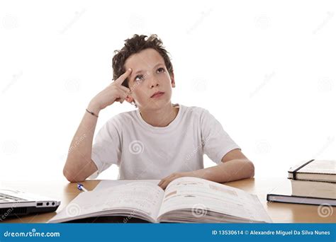 Cute Boy On The Desk Studying And Thinking Stock Images Image 13530614