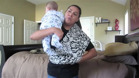 A baby glider lets you soothe and calm your little one; How To Use Munchkin Sling - YouTube
