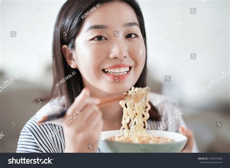 Young Asian Women Eating Instant Noodles Foto Stok 1783167683 Shutterstock