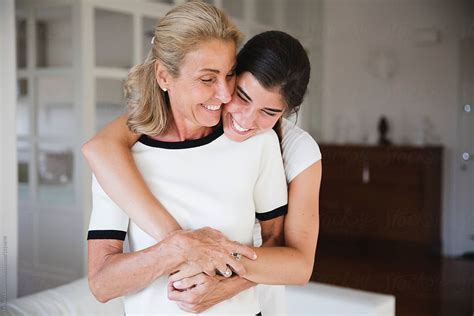 Happy Daughter Embraces Her Mother By Stocksy Contributor Michela