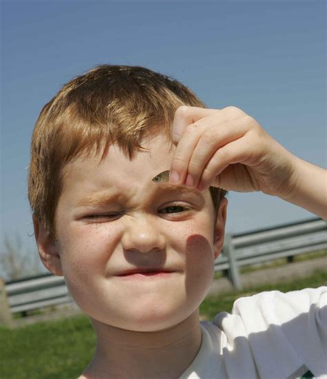 Fileclose Up Of Face Of Young Boy Holds A Small Fish Wikimedia