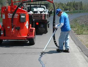 Hot crack filling and repairs for increased asphalt life ...