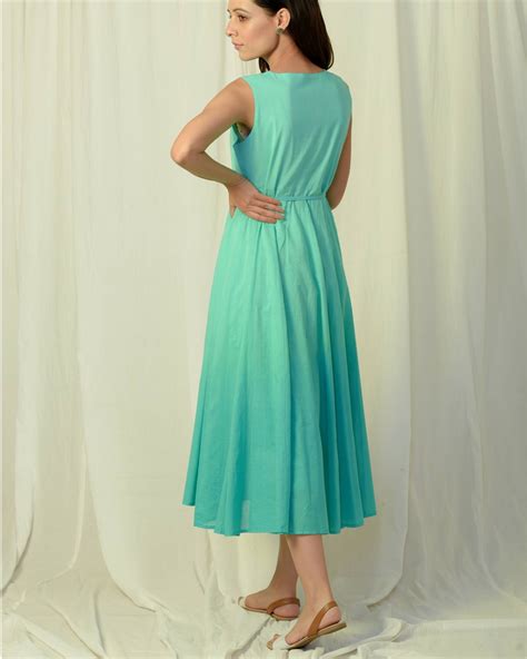 Jessica simpson cap sleeve dress aqua green. Turquoise green high low dress by Charkhee | The Secret Label