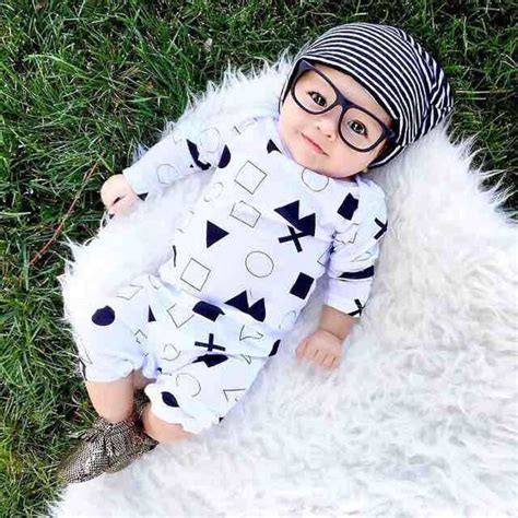 Cute two years old boy taking out washed clothes from washing machine and giving it to his mother. 2016 Unisex Newborn Baby Boys Girls Clothes Geometical ...
