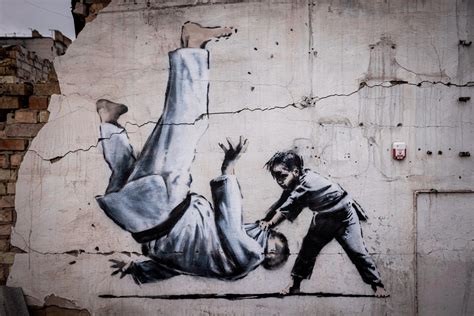Banksy In Ukraine Street Artist Unveils Mural In Borodianka Ukrainian Town Liberated From