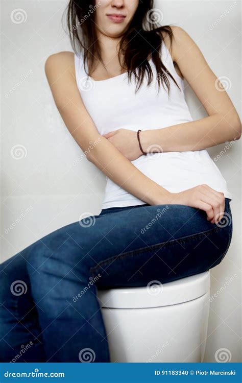 Babe Woman Sitting Next To Toilet Highres Stock Photo
