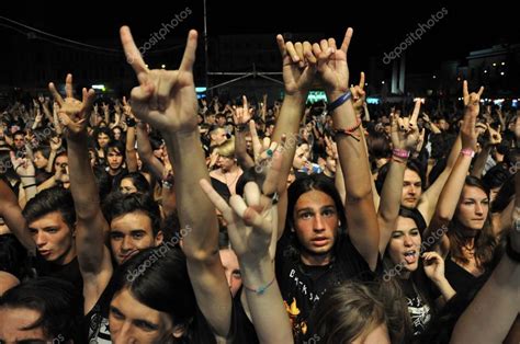 Headbanging Crowd At A Rock Concert Stock Editorial Photo © Salajean