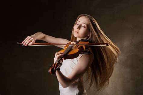Beautiful Young Woman Playing Violin Over Black Blog Of Antano Solar John
