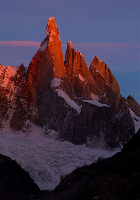 A Tower In Flames Strong Pre Sunrise Glow From Opposing Clouds